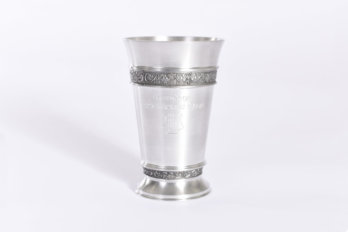 Drinking cup with engraving